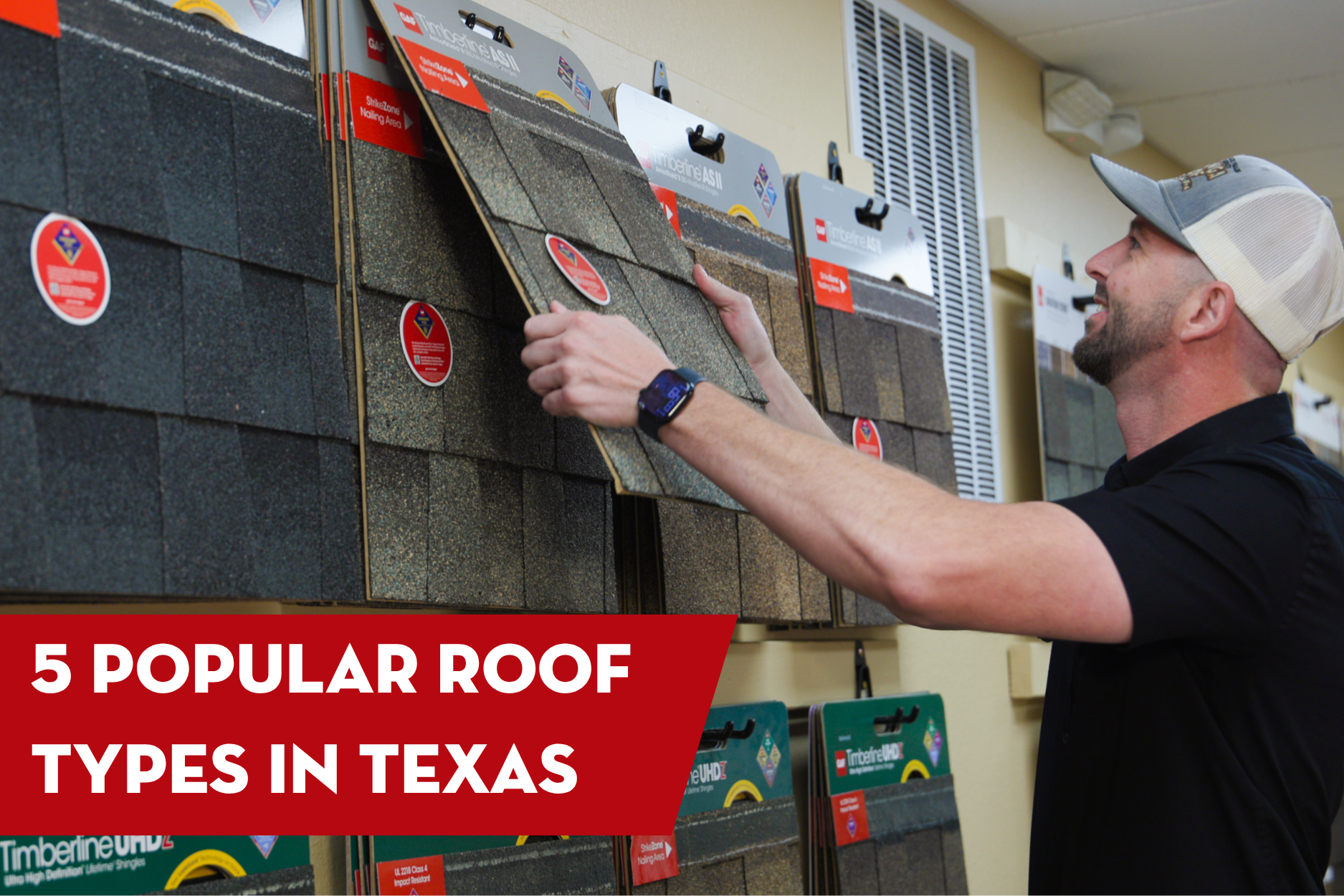 Roofing professional comparing asphalt shingle samples on a showroom display.