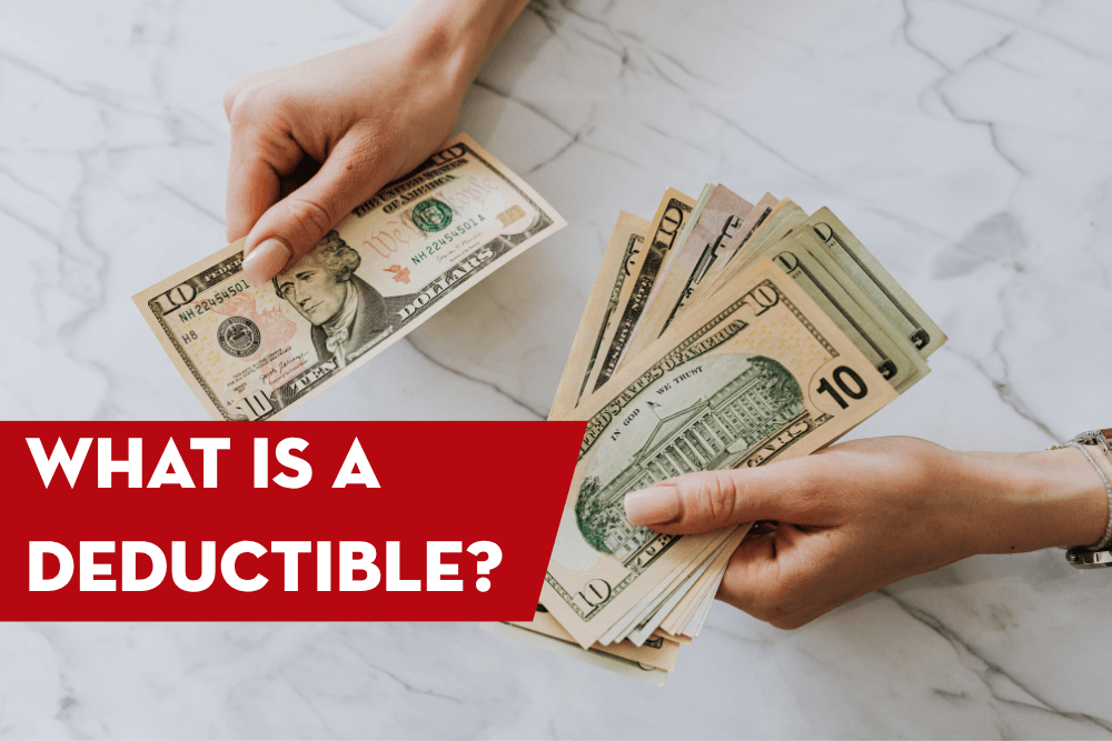 Hands exchanging cash, illustrating how an insurance deductible is paid before insurance coverage applies to a claim.