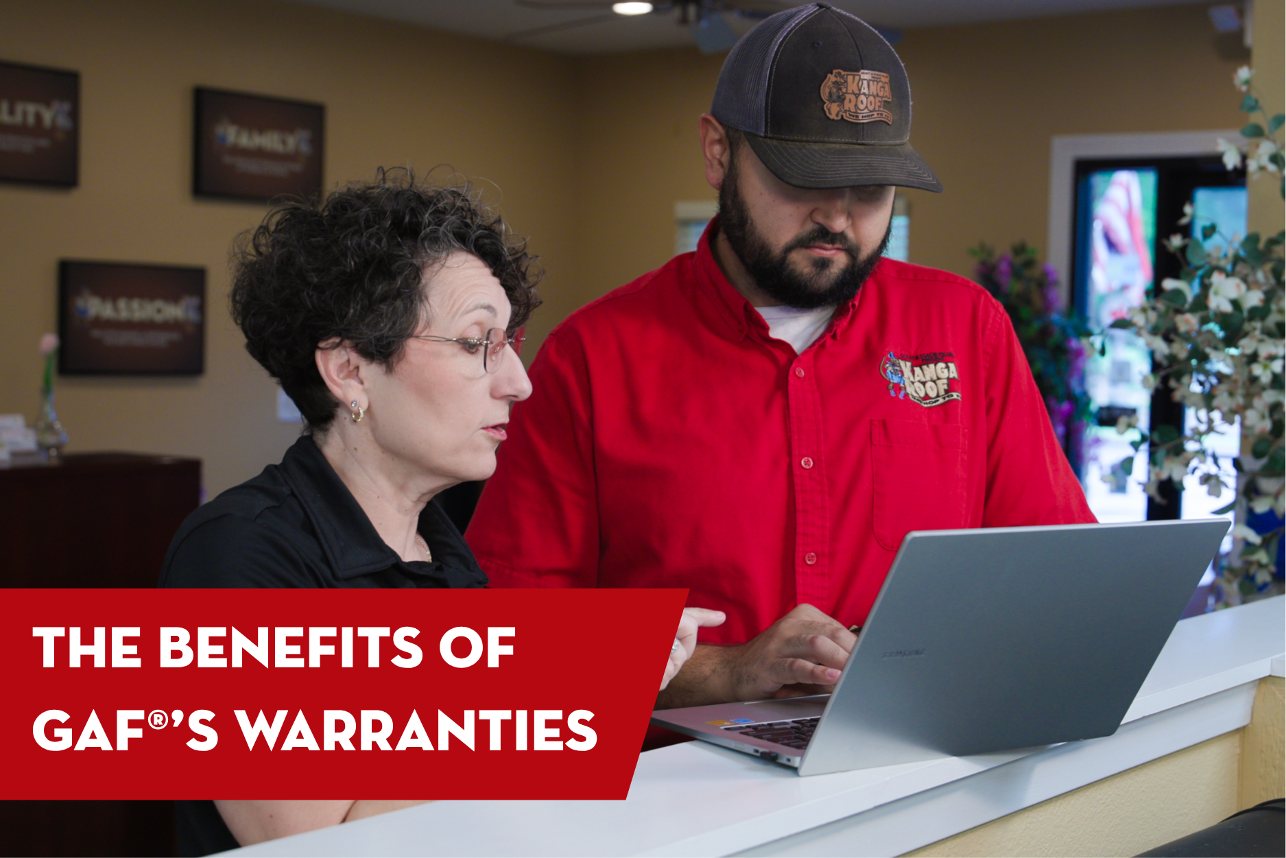 Homeowner meeting with a roofing professional to discuss the benefits of GAF roof warranties, including protection, coverage, and long-term value