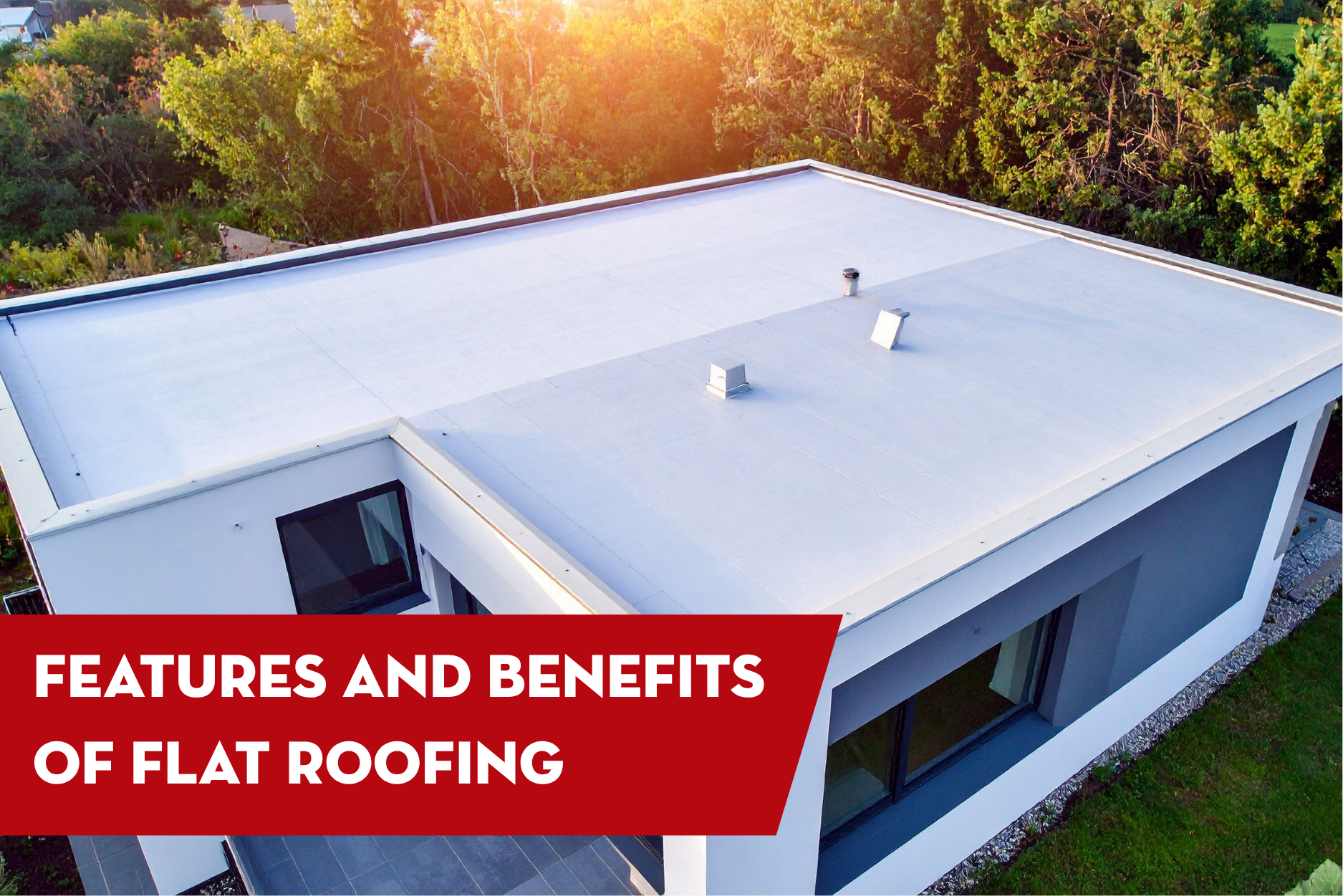 Aerial view of a contemporary house with a flat roof installation, showcasing energy efficiency, modern design, and low-maintenance roofing benefits