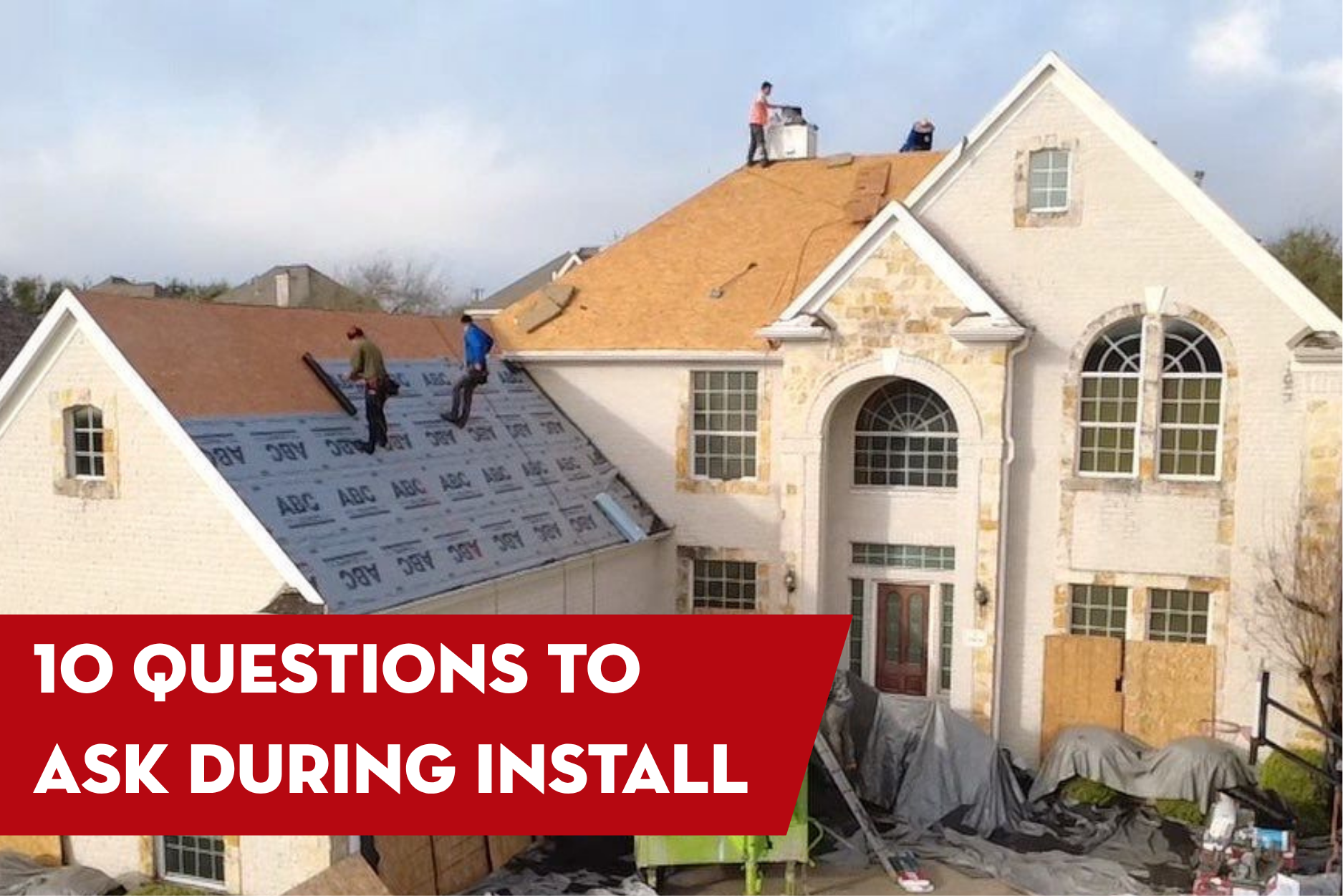 Roofing crew installing a new residential roof on a large home with text overlay about 10 questions homeowners should ask during a roof installation
