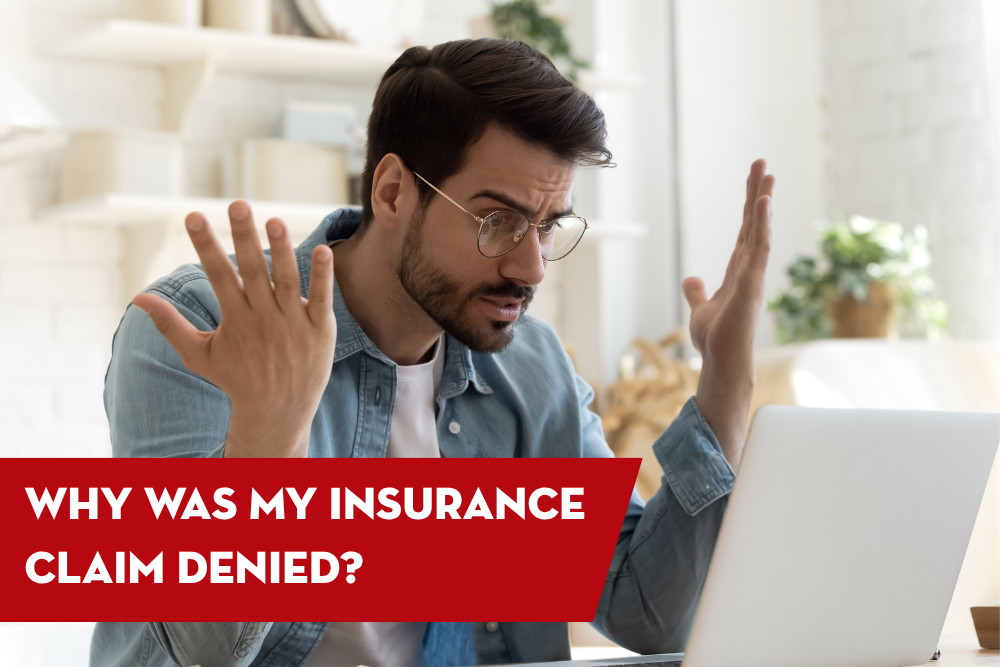 Man looking confused and stressed while checking a denied home insurance claim online, highlighting common reasons roof claims get rejected