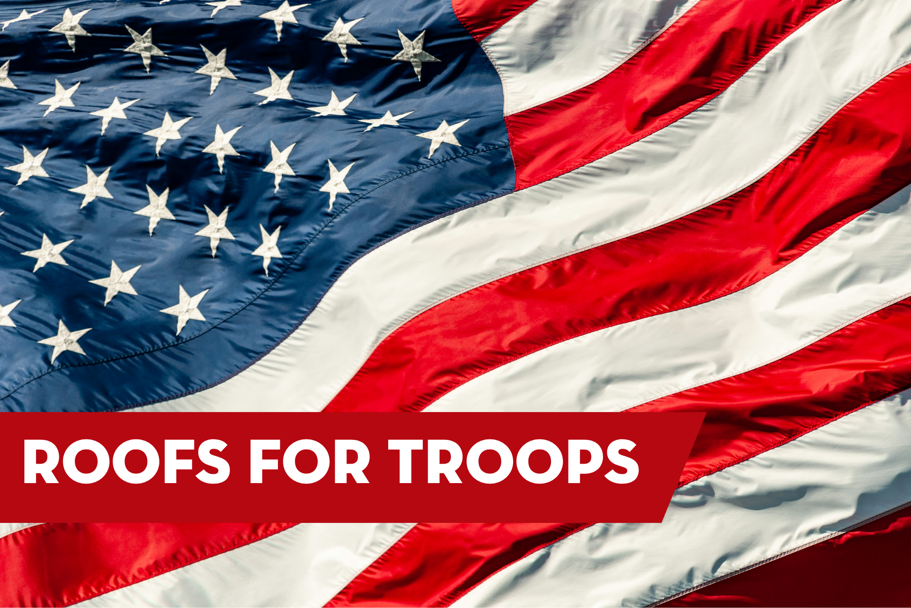American flag waving with text promoting a “Roofs for Troops” roofing program supporting military members and veterans